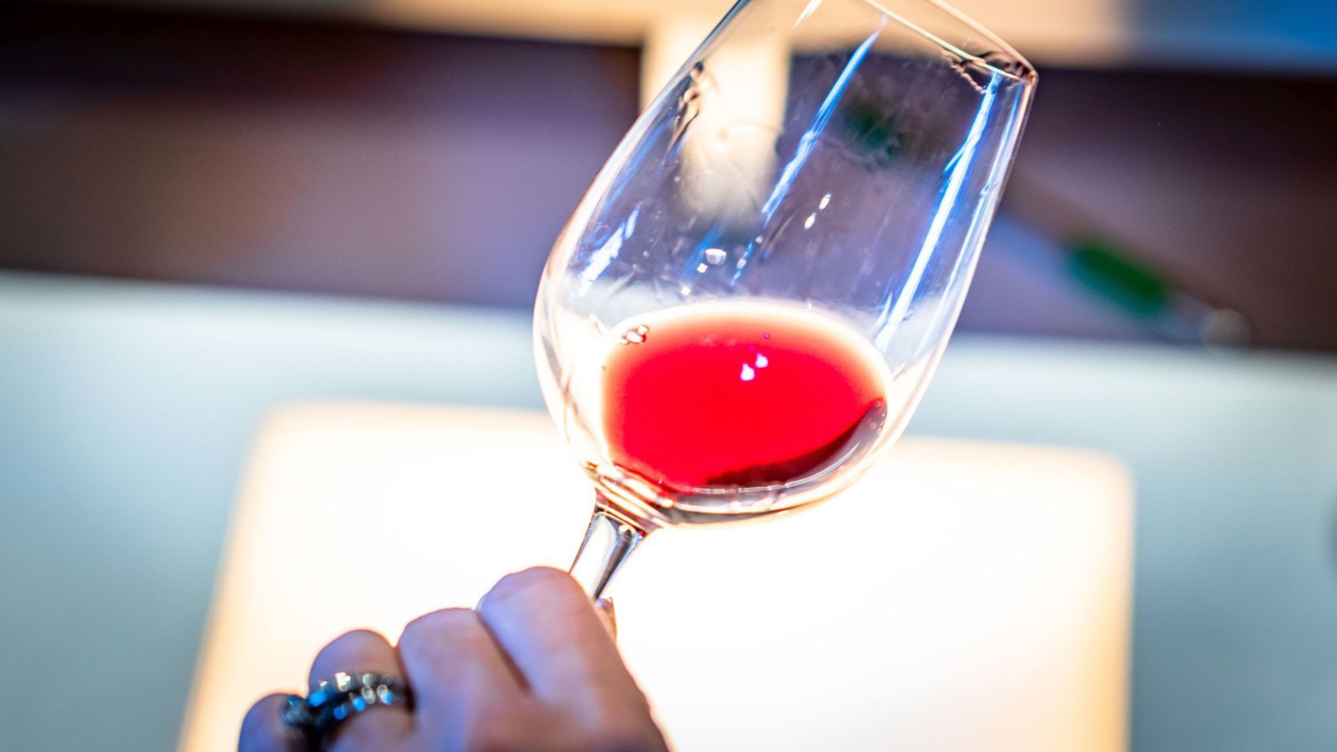 Tipping a glass of Napa Valley wine